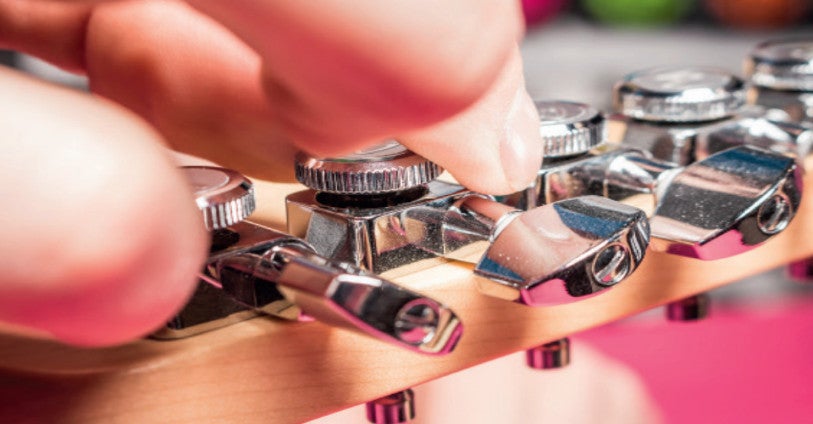 Snaren vervangen op een elektrische gitaar