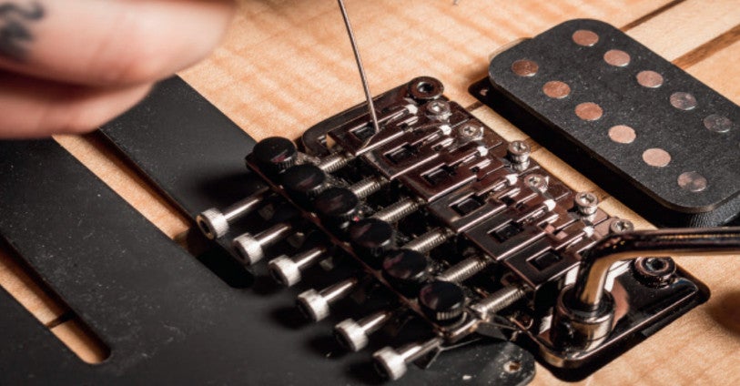 Snaren vervangen op een elektrische gitaar