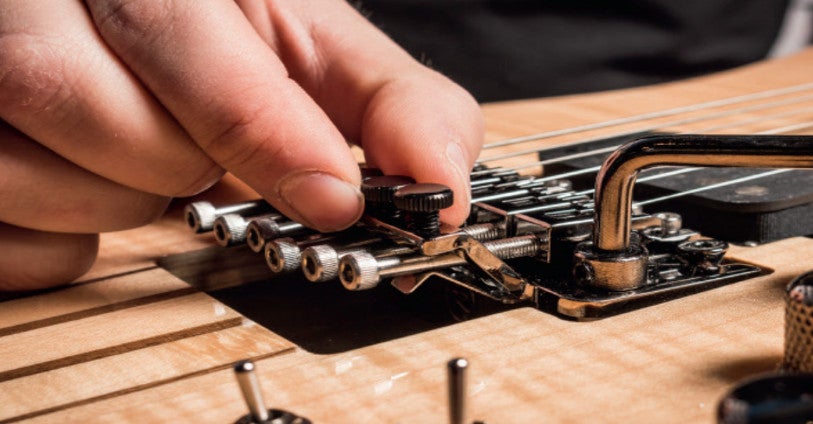 Snaren vervangen op een elektrische gitaar