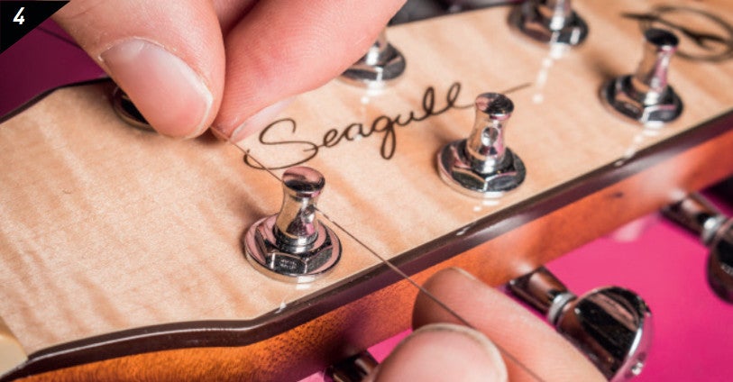 Hoe vervang je de snaren op een akoestische gitaar?