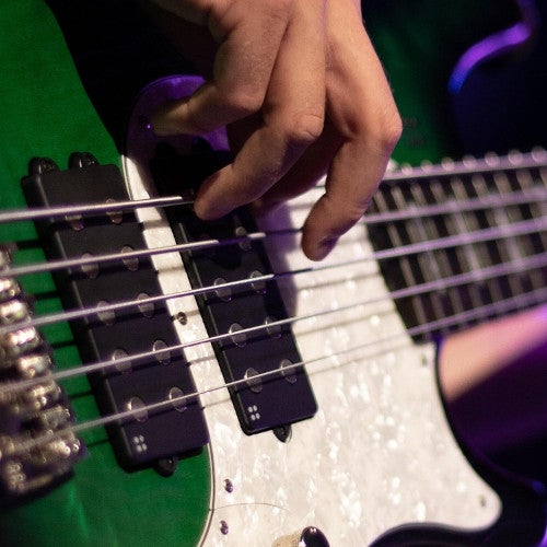 7. Wat is een humbucker? En wat is het verschil met een single coil en split coil?