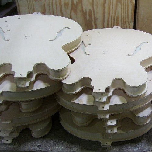 Quels sont les bois utilisés pour les guitares hollow body ?